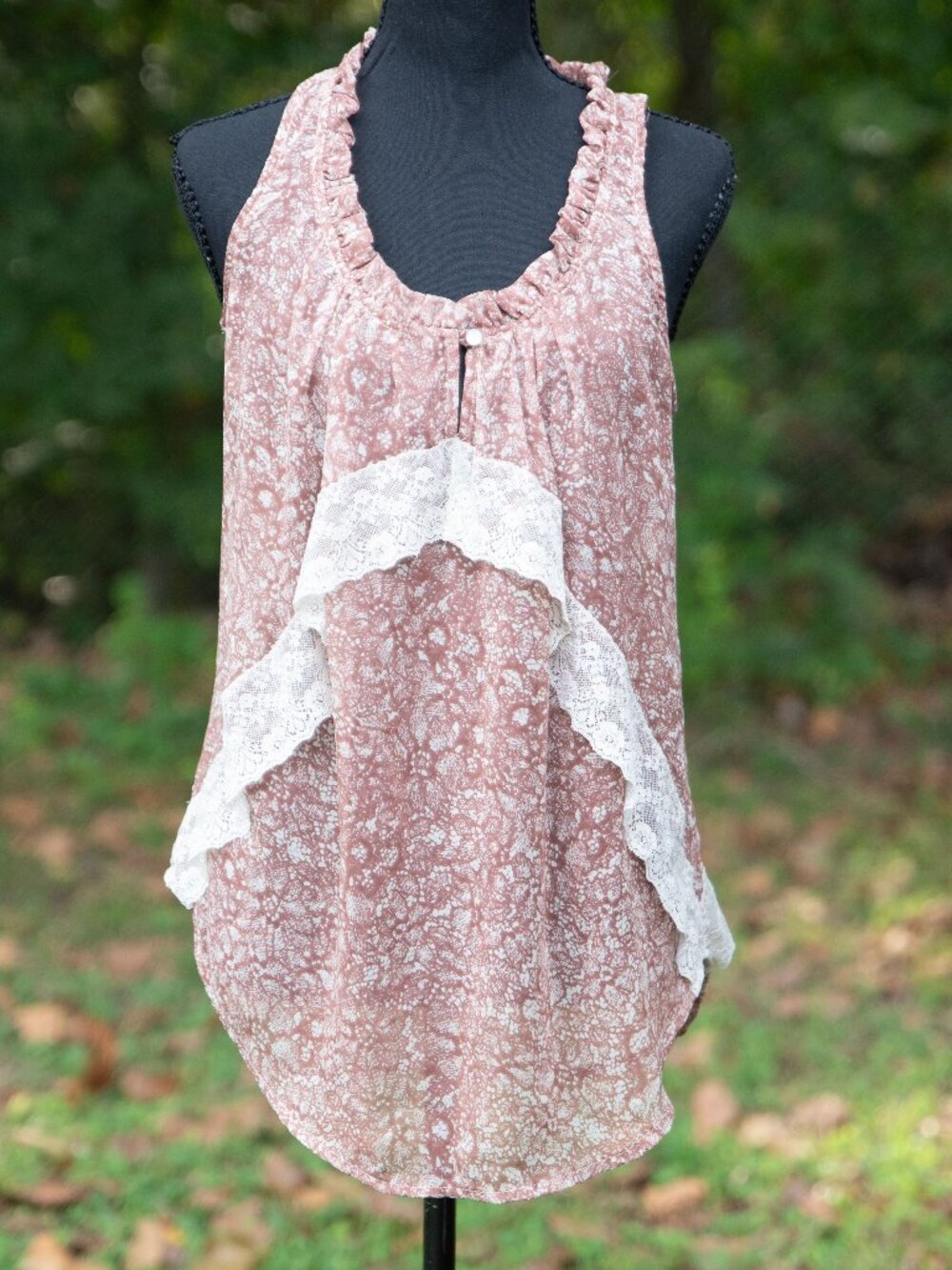 Size Small Lily White bohemian-style blouse in a dusty pink/mauve floral print